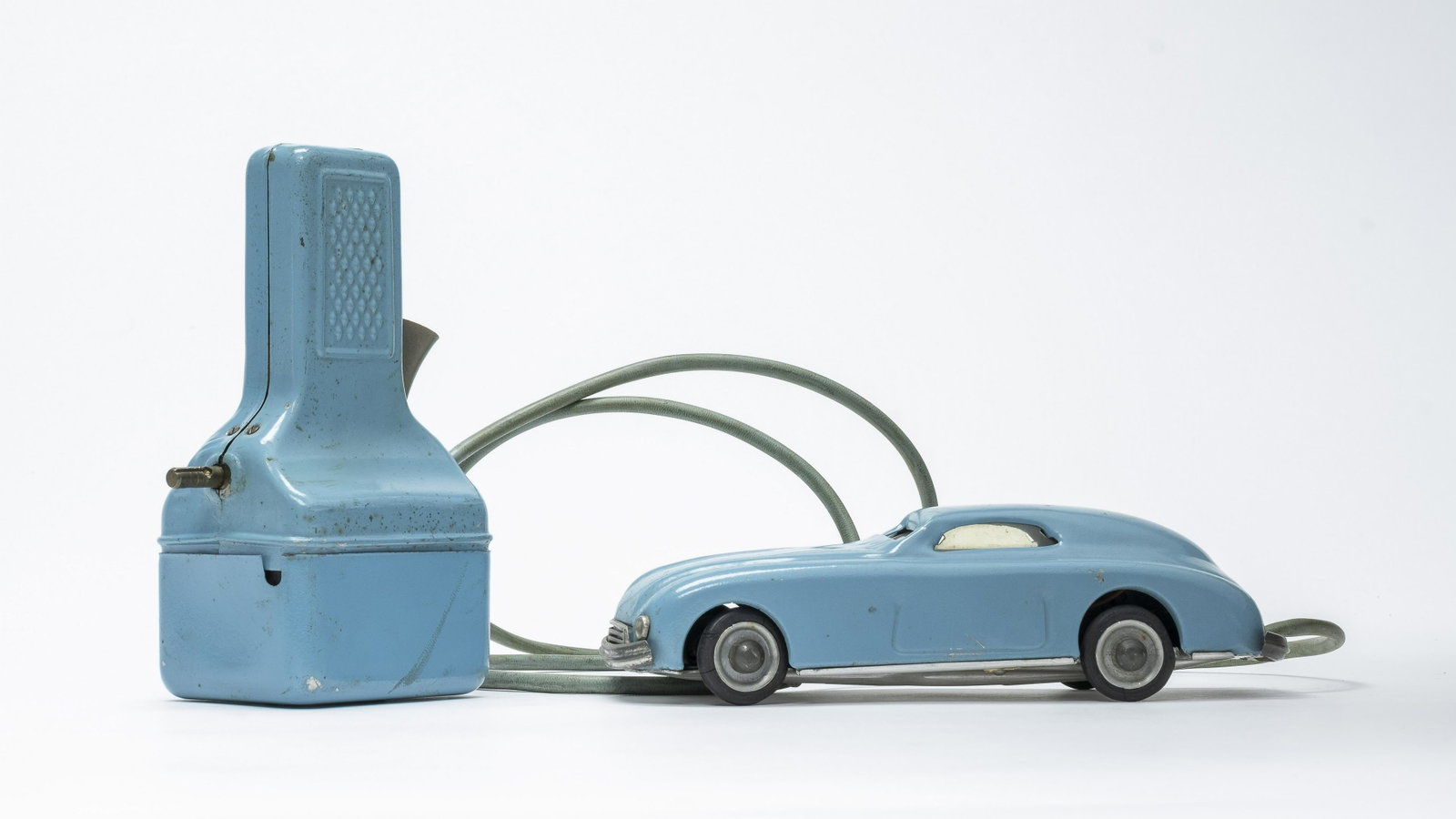 Nigam Sedan: Italian - 1950's - 7.75" L The toy in excellent condition needs a light cleaning.