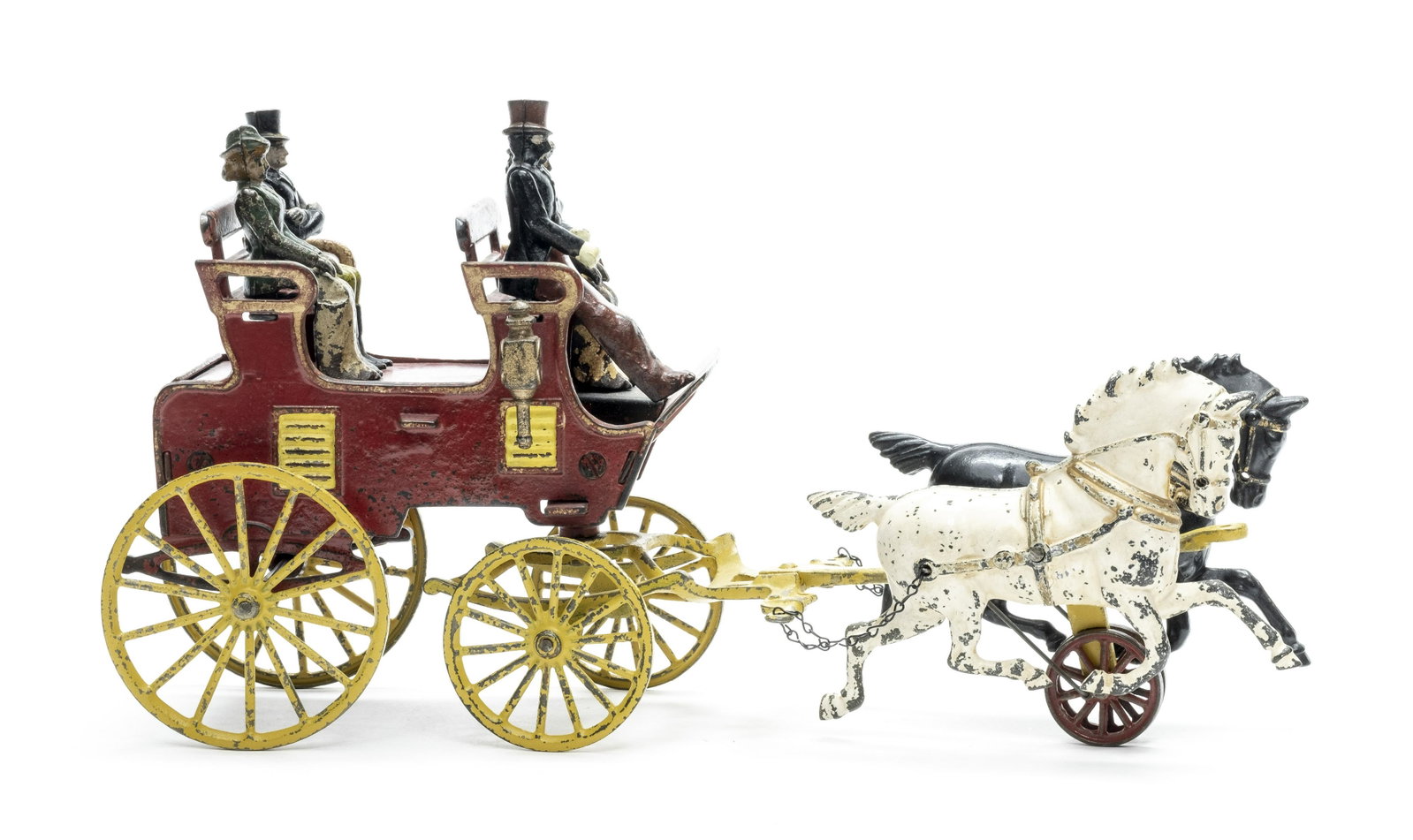 Two Seat Brake Iron Horse Drawn Toy: By Hubley Mfg. Company Lancaster, PA - Circa 1906 Excellent Original Condition (Figures with Minor Retouch) Among collectors of fancy carriage toys, the various sizes of brake coaches are reserved a p