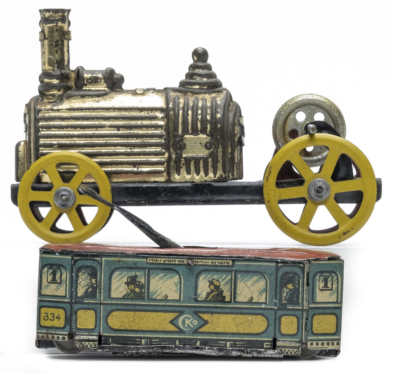 Two Penny Toy Trains: Windup CKO Trolley and a Gyroscopic Locomotive German & French - Circa 1910's Very Fine Original Condition