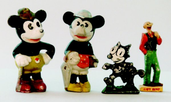 Comic Toy Lot Mickey, Minnie, Felix: Lot includes: bisque Mickey and MinnieMouse, lead Felix the Cat and hardplastic Andy Gump. Mickey and Minnieabout 4" tall.Condition: Fine to Excellent