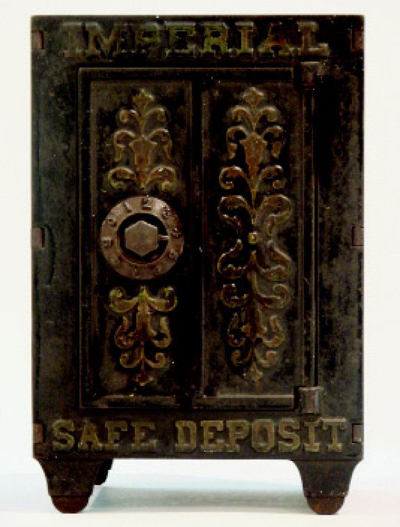 Imperial Safe Deposit Safe Bank: American – Circa 1895 A large scale and scarce safe bank. It is 8 ½" tall. Material: Cast Iron Condition: Excellent