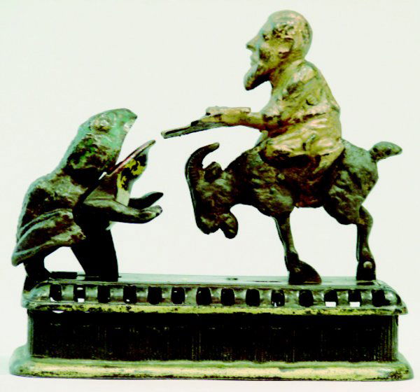 Goat, Frog and Old Man Mechanical Bank: A wonderful and rare bank made by Mechanical Novelty Works of New Britain, Connecticut circa 1885. Also known as the "Initiating Bank – 2nd Degree". It functions by placing a coin in the man's tray