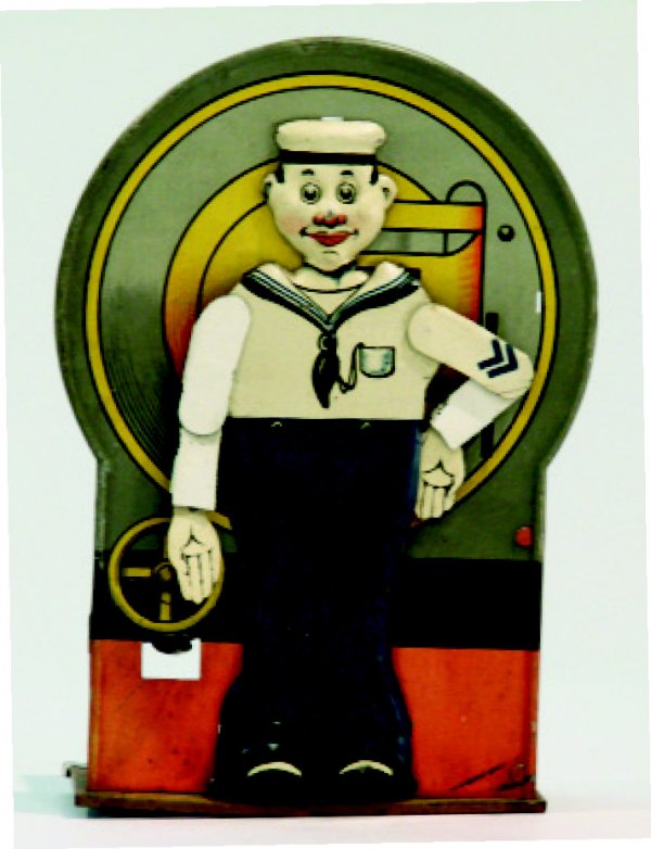 Saluting Sailor Saalheimer & Strauss - Mechanical: Made by Saalheimer and Strauss of Germany circa 1915. Condition: Tin Provenance: John Haley Condition: Very Fine, some dents, and minor rust underneath bank