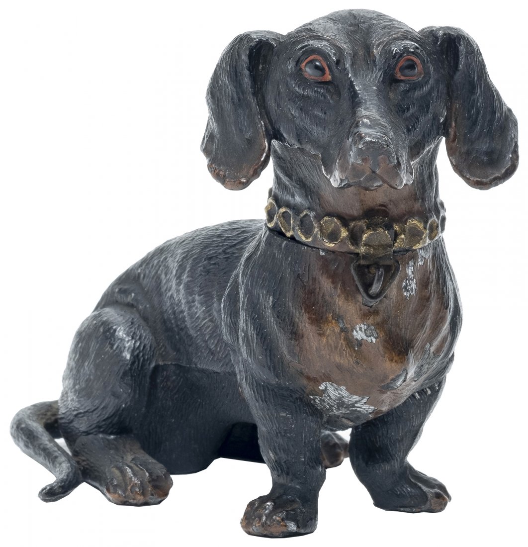 Large Seated Dachshund Bank: German - 1920's - 4" T. Pristine Condition. This is the finest painted example of this bank that we have seen.