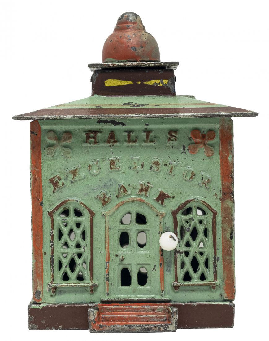 Hall's Excelsior Cast Iron Mechanical Bank: Scarce Candy Apple Green. J. & E. Stevens Company, Cromwell, Ct. - Circa 1870's. Excellent Plus Condition. Dating to 1869, John Hall's Excelsior Bank has great historical significance as the first mec