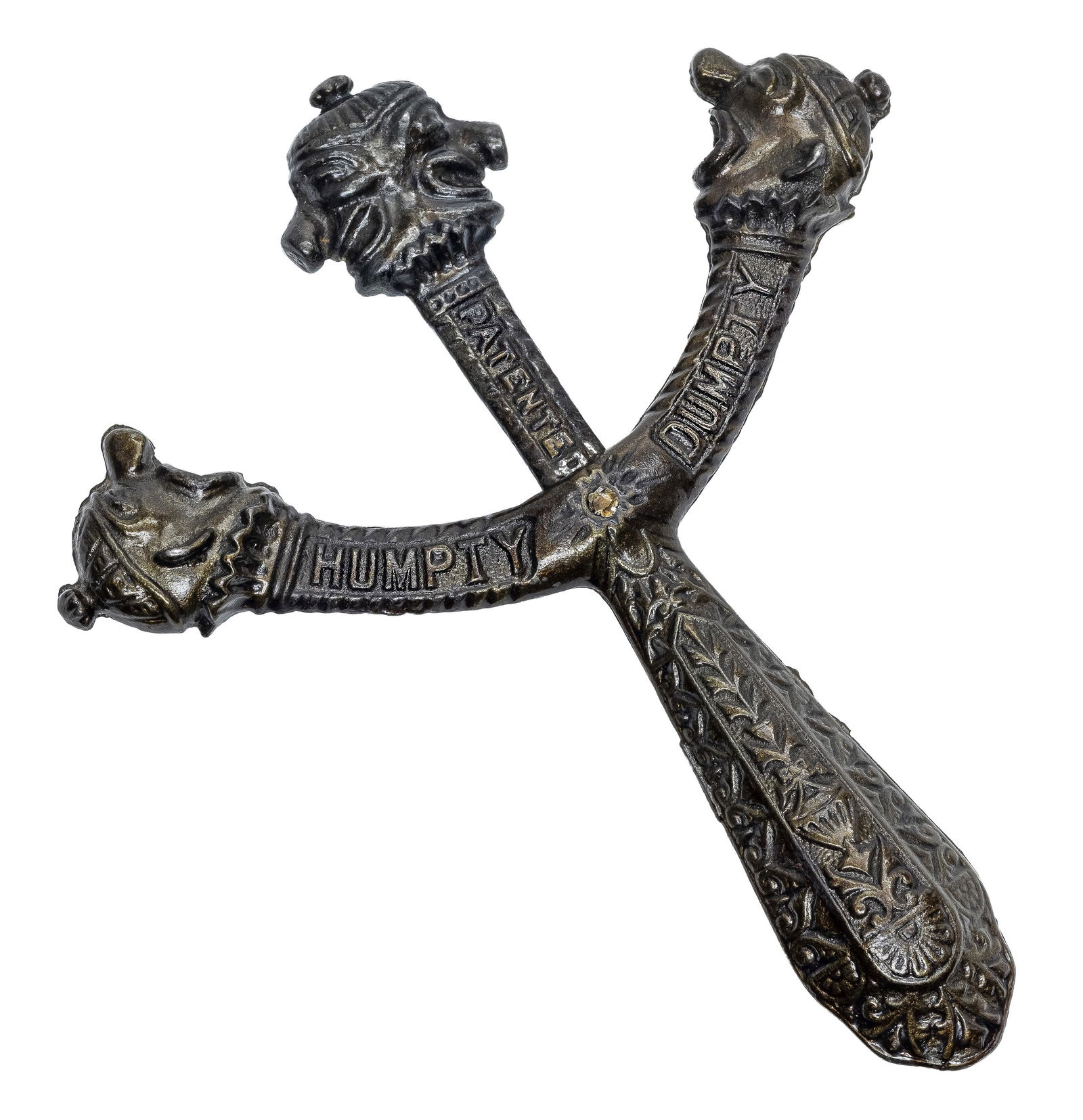 Rare Humpty Dumpty Cap Toy: Deluxe Three Armed Version By Ives, Blakeslee & Company Late 1880's - 6 1/2" T x 4 3/4" W Gertrude Hegarty Collection. In this deluxe version of the toy, four clown heads bang together to explode caps