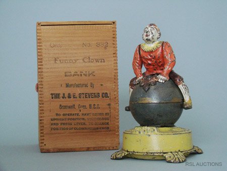 CLOWN ON GLOBE MECHANICAL BANK WITH BOX: CLOWN ON GLOBE MECHANICAL BANK WITH BOX Made by the J. & E. Stevens Company Cromwell, Connecticut – Circa 1890 When the globe is brought into position and the lever is released, the globe and the cl
