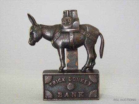 TRICK DONKEY MECHANICAL BANK: TRICK DONKEY MECHANICAL BANK Probably Ives, Blakeslee & Williams Bridgeport, Connecticut – Dated March 1897 Only the second Trick Donkey bank to come to light. This bank with its patent date of Marc