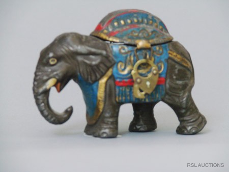 Elephant with Howdah, Small German Spelter Still Ba: Germany – Circa 1920; This guy is really cute. About 4" long.