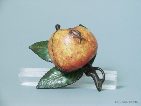 Apple Bank Still Bank: Kyser & Rex Circa 1890; Philadelphia, Pennsylvania Another colorful and charming bank. Engraved "K&R" on one of the leaves. To our knowledge this is the only time Kyser & Rex labeled a product. Materi