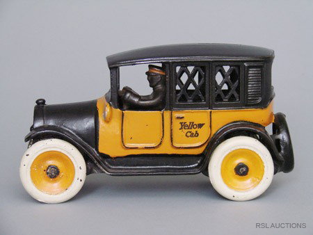 Yellow Cab Still Bank: Made by Arcade Mfg.; Freeport, Illinois – Circa 1921 A scarce and very desirable automotive still bank. It is approximately 8 inches long and in unusually pristine condition. Material: Cast Iron