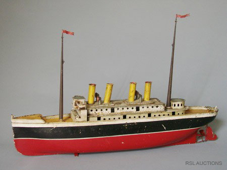 Bing Ocean Liner: Gebruder Bing Nuremberg, Germany – Circa 1915 A classic windup toy boat by Gebruder Bing of Germany circa 1915. The toy is about 20" long. Material: Sheet Steel