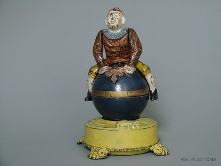 Clown on globe – yellow Base Mechanical Bank: Made by the J. & E. Stevens Company Cromwell, Connecticut – Circa 1890 When the globe is brought into position and the lever is released, the globe and the clown whirl around in a very amusing manne