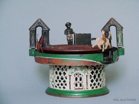 Horse Race, Flanged Base Mechanical Bank: The J. & E. Stevens Company Cromwell, Connecticut – Circa 1871 Place the horses adjacent to the star on the top plate. Pull the string out to set the bank. Drop a penny inthe coin slot and the horse