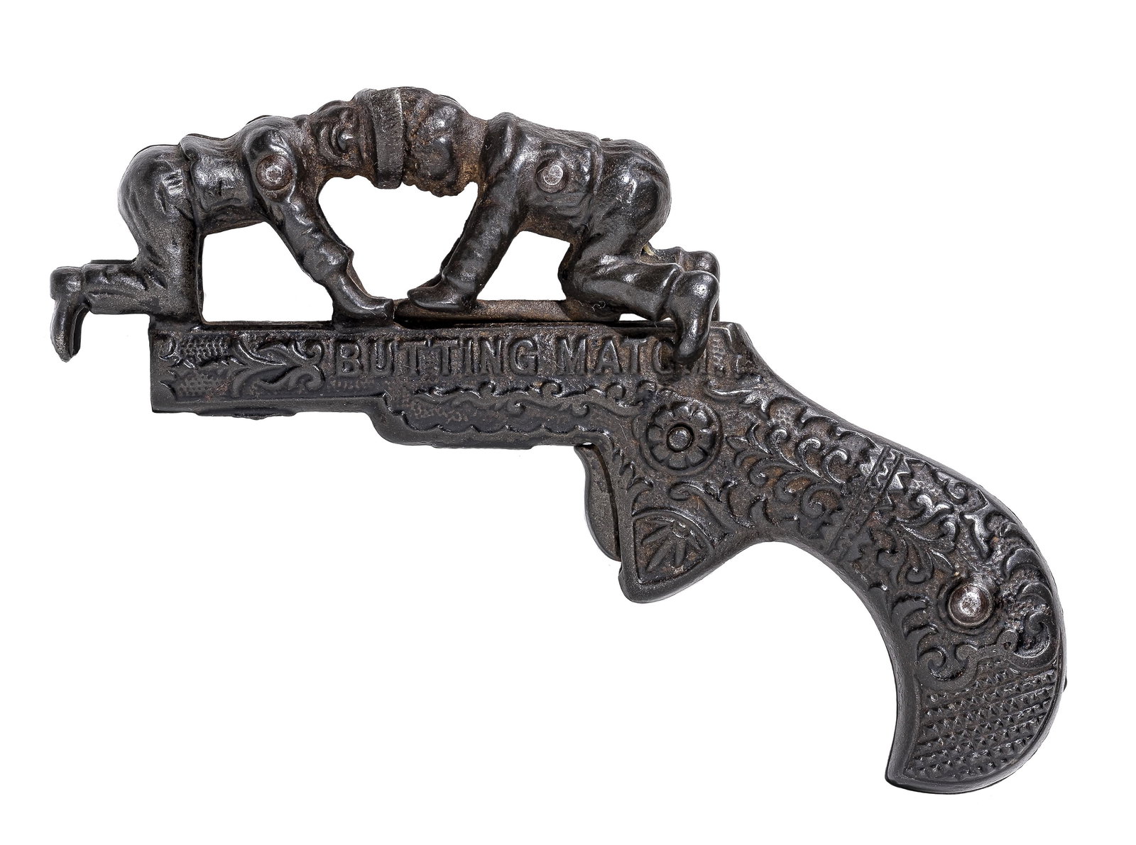 Butting Match Cap Pistol: By Ives, Blakeslee Company. Made Mid 1880's - 5" Long. Two boys confront each other on hands and knees. When the trigger is pulled, the boy on the right slides forward to "butt heads" with his friend,
