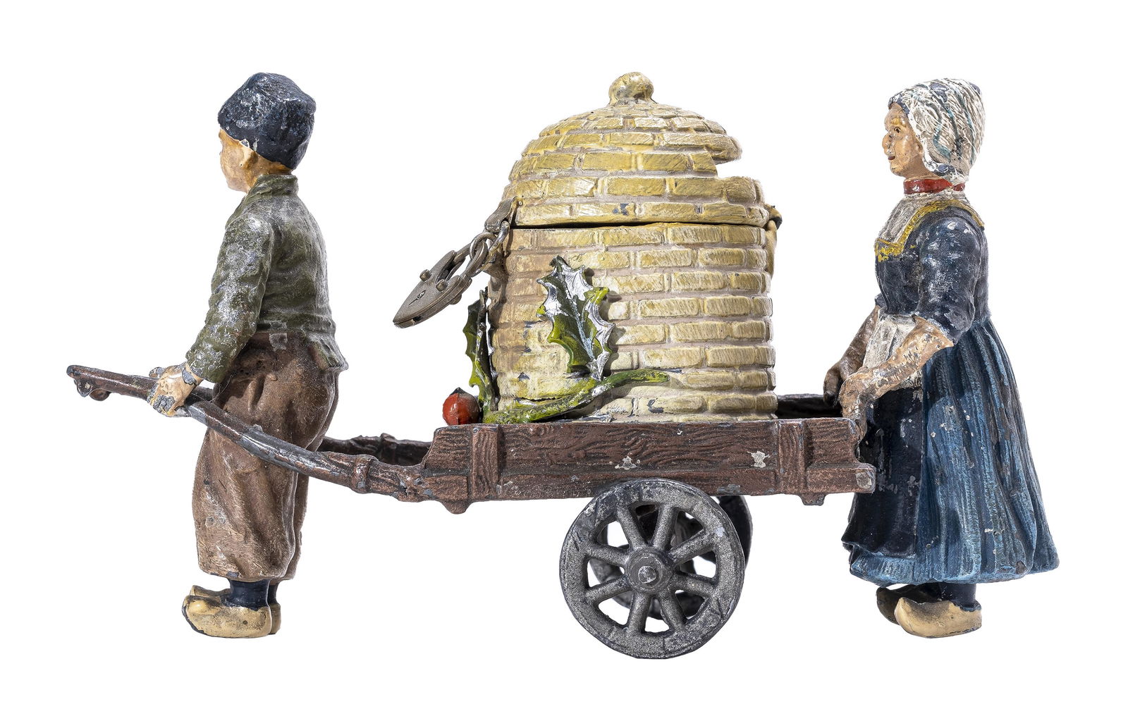 Dutch Boy & Girl Transporting a Beehive Spelter Bank: Germany - Early 1900's - 6 1/4" Long. Ex - Donal Markey Collection. This toy bank is a veritable masterpiece in the spelter medium. In terms of color and design, it brings together many separately cas