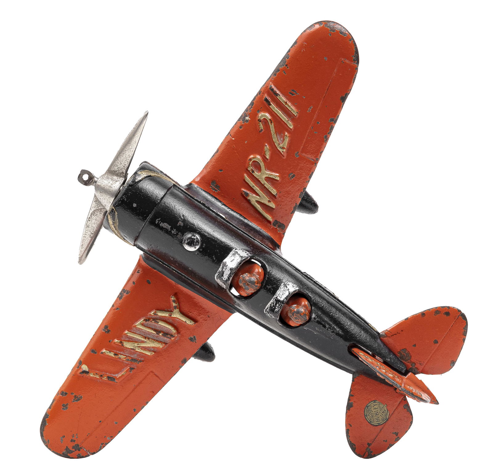 Lindy NR-211 Lockheed Sirius Iron Toy: Made by Hubley Toy Company. Lancaster, Pa. - 1932 - 9 1/4" L x 10 1/2" WS. In 1931 Charles & Anne Lindbergh began "the Great Circle Route" from New York to Tokyo. They used a red and black Sirius airp
