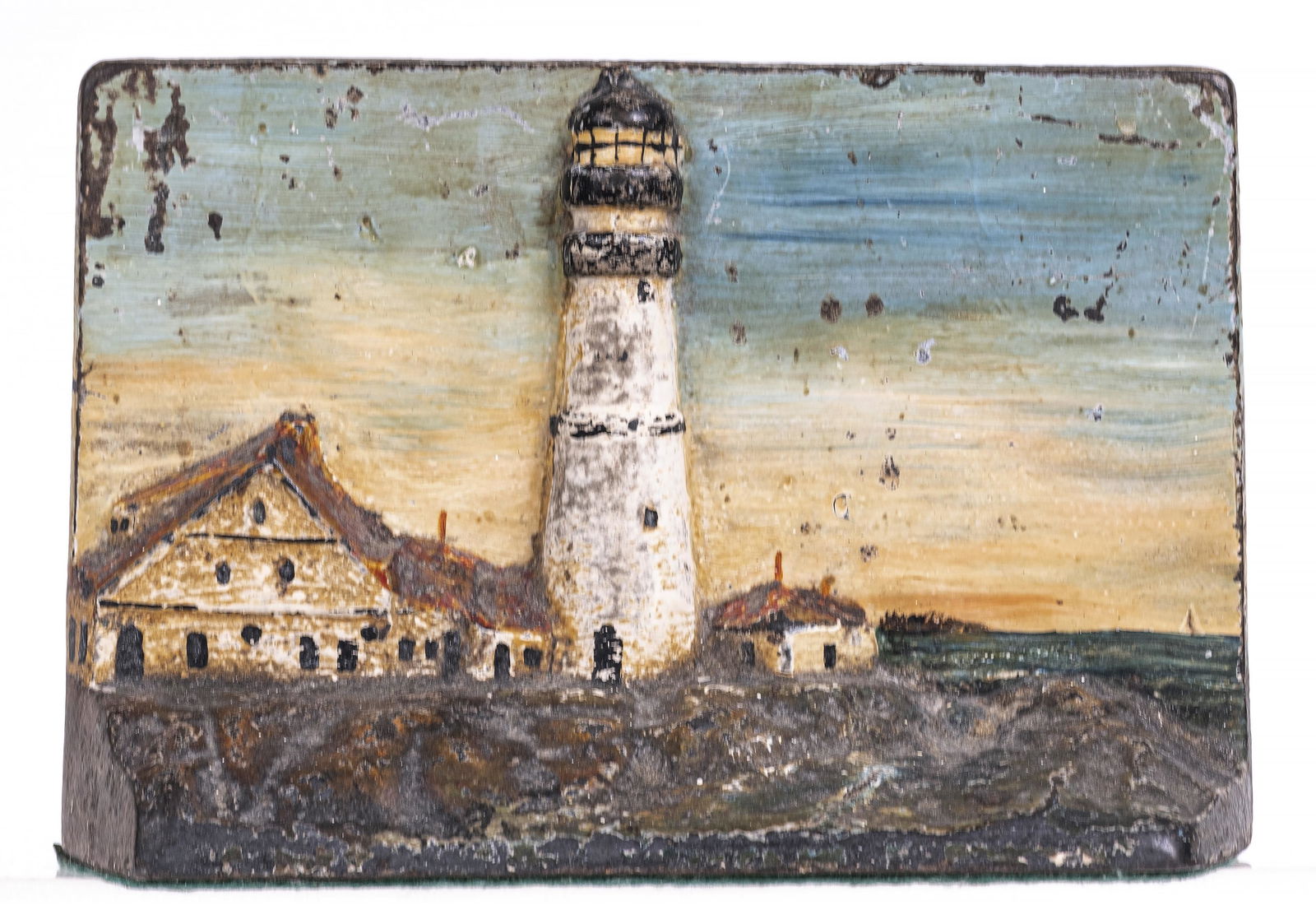 Lighthouse Iron Doorstop: American - 1920. 7 1/2" Wide x 5" Tall.