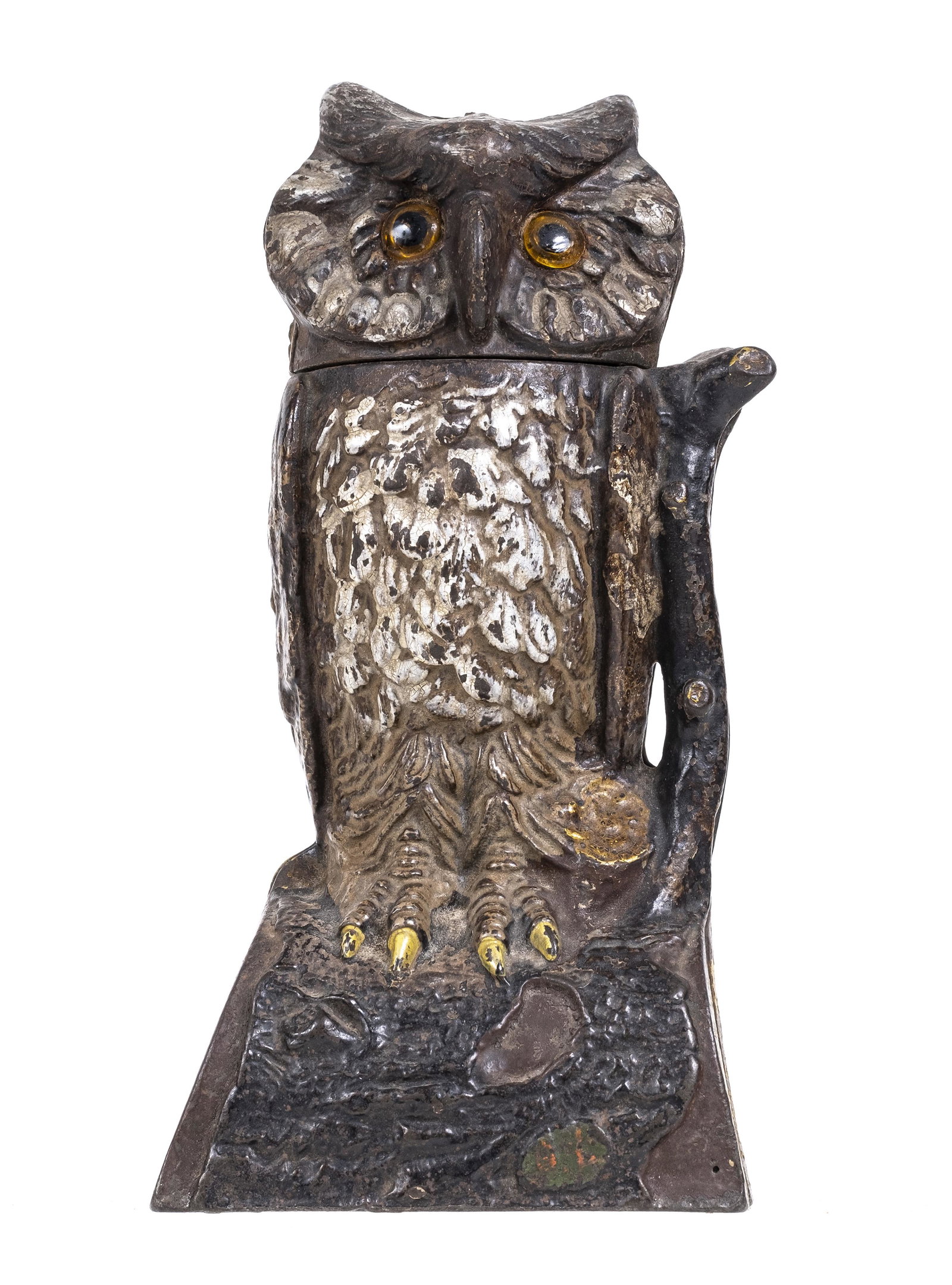 Owl Turns Head - Cast Iron Mechanical Bank: Made by the J. & E. Stevens Company. Cromwell, Connecticut - 1880's. Put a coin in the tree branch and press the lever. The owl's head turns and the coin drops into the aperture. Release the lever and