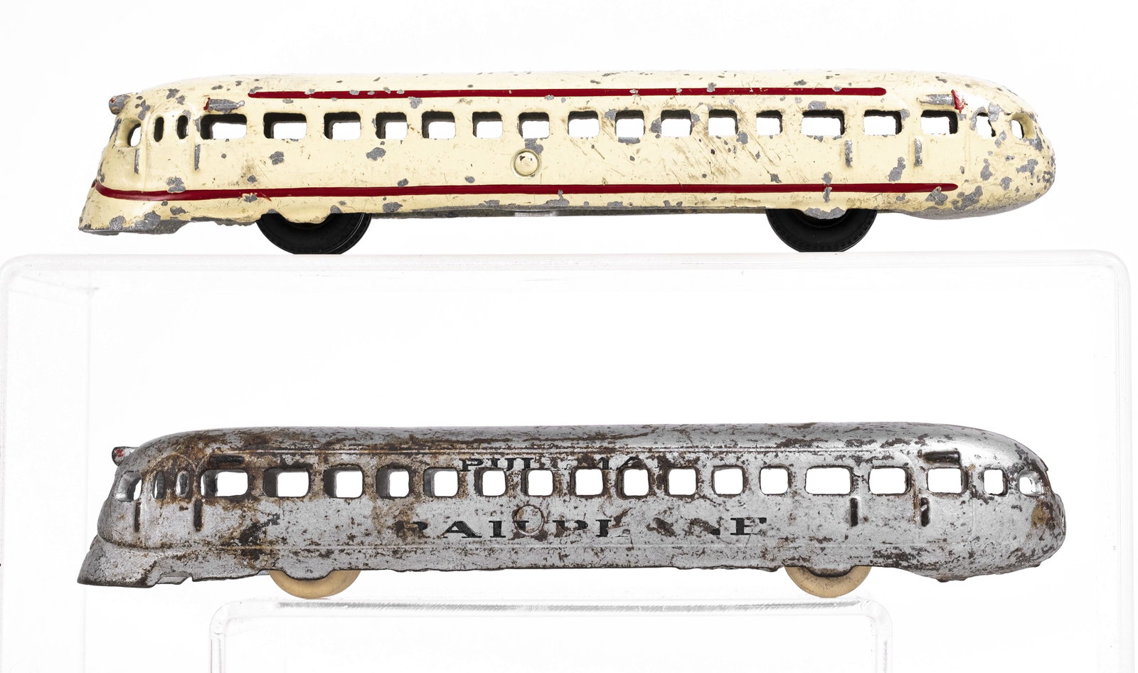 Two Railplanes - Trains: Made by Arcade Mfg. Company. Freeport, Illinois - 1930's. 8 1/2" Long. One cast iron and one aluminum.