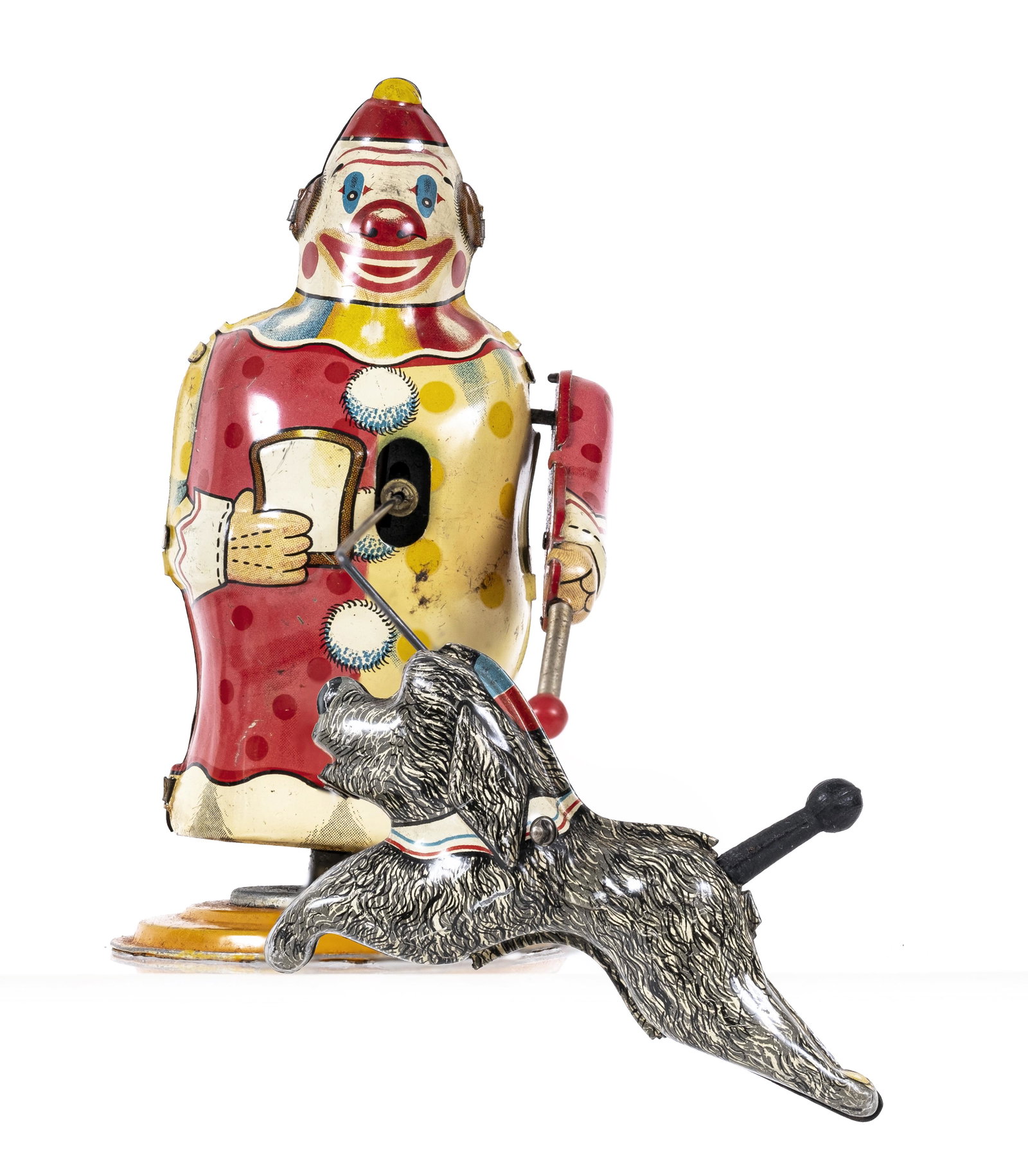 Clown Training Circus Poodle Tin Toy: Made by T. P. S. Japanese - 1950 - 4 1/2" Tall. The toy works well.