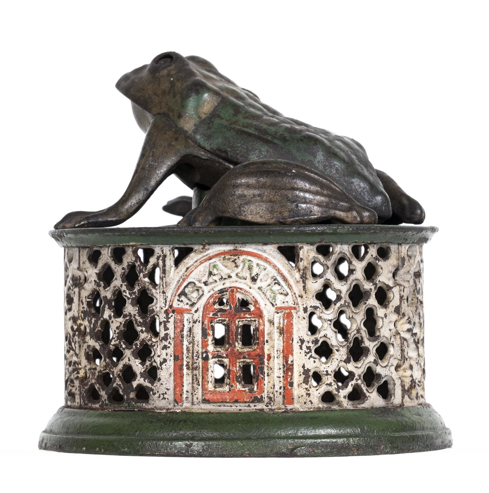 Frog on Lattice Iron Mechanical Bank: Made by J. & E. Stevens Company. Cromwell, Connecticut - Circa 1875. Historically, this coin-swallowing amphibian is one of the earliest toy banks ever created.