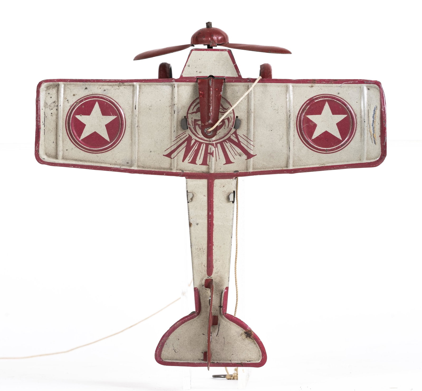 Monoplane "USA" Tin Toy: Made by Nifty Toys. German - 1920's - 8" Long. The hand activated pull mechanism is frozen at present.
