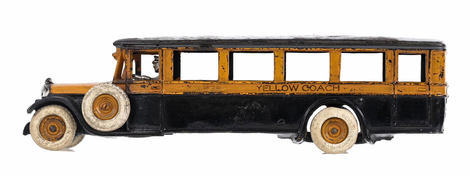Scarce Yellow Coach Passenger Bus - Cast Iron Toy: Made by the Arcade Manufacturing Company. Freeport, Illinois - Late 1920's - 12 3/4" Long. The Yellow Coach Company was an early manufacturer of passenger buses in the United States. They operated out