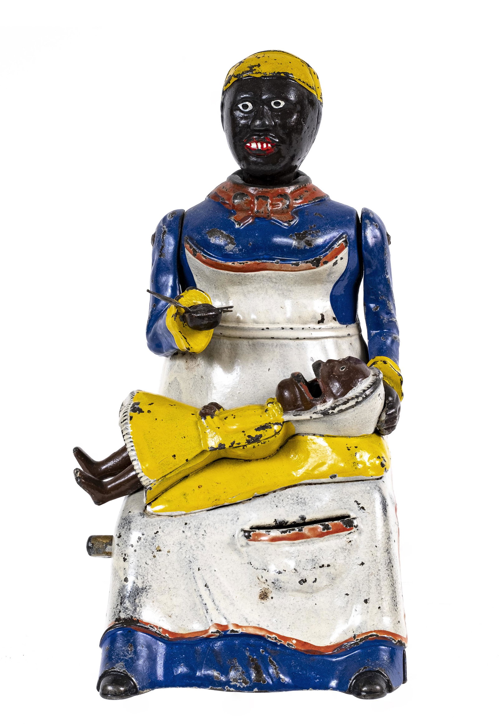 Mammy - Cast Iron Mechanical Bank: Blue Dress Version. By Kyser & Rex Company. Philadelphia, Pa. - Ca. 1885. The Mammy Bank portrays an intimate moment of a mother feeding her infant child. She has placed her baby carefully in her lap 