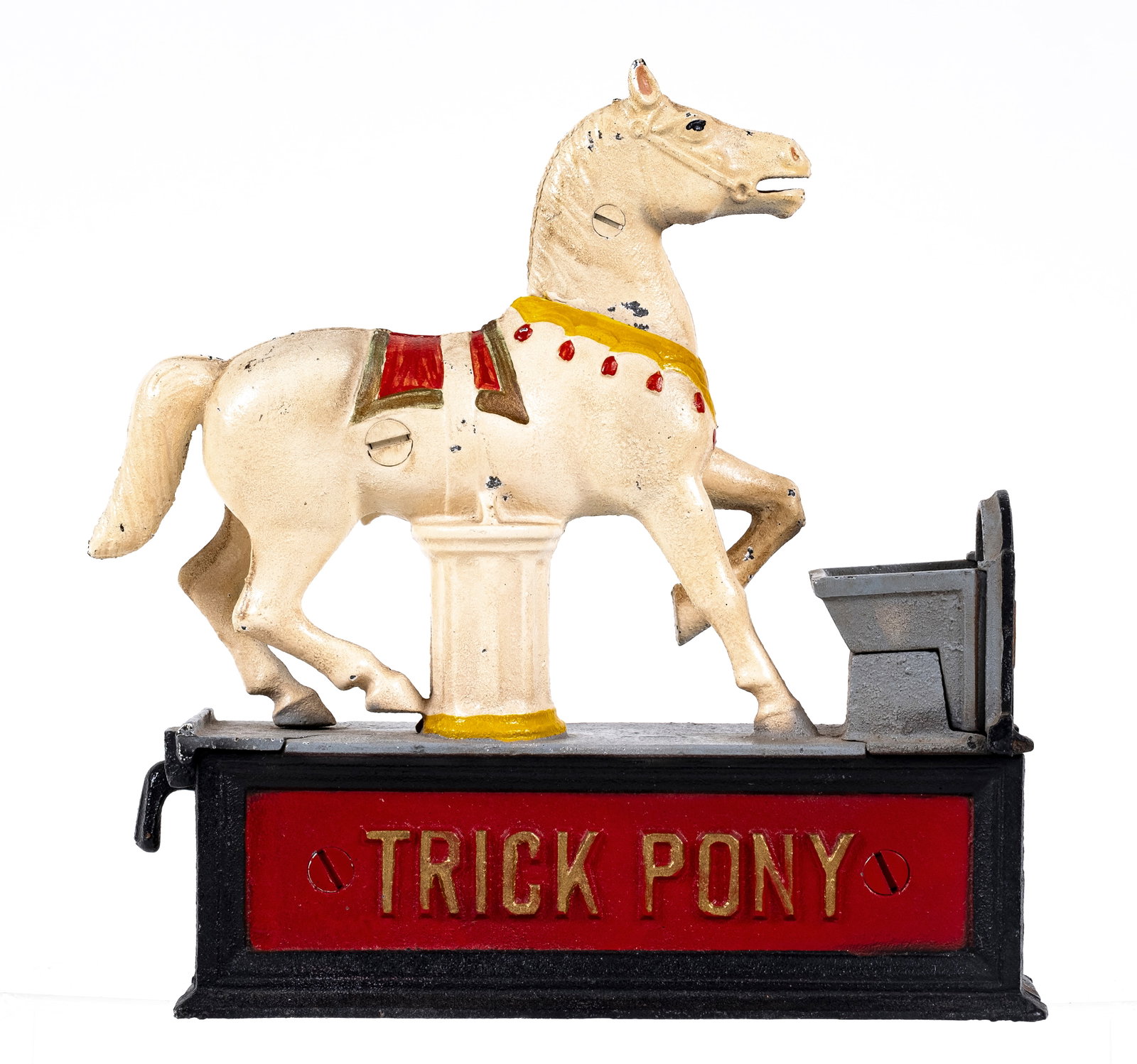 Trick Pony - Cast Iron Mechanical Bank: Made by Book of Knowledge. Made of Cast Iron. Place your coin in the ponies mouth, pull the lever, the pony will drop the coin into his trough. 7" Wide. Works well.