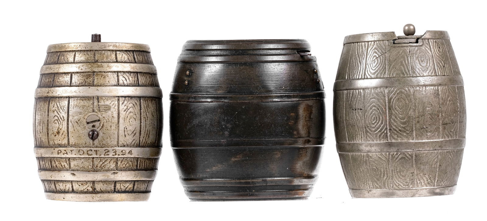 Three Barrel Shaped Cast Iron Still Banks: White City Puzzle No. 12 - Nicol & Company - 3 3/4" Tall. Dime Register Barrel - American - 4" Tall. 3 Coin Registering Bank - Piaget Novelty Company - 4" Tall (Tin).