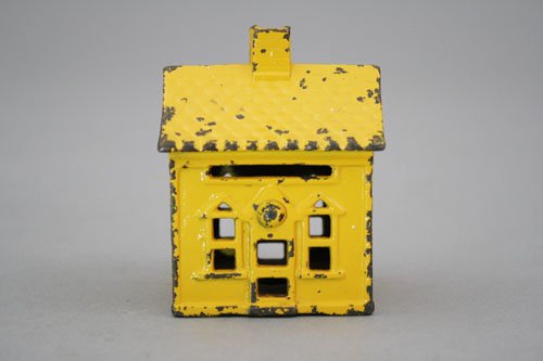 One Story House, Yellow: Kenton Hardware Company Kenton, Ohio – Circa 1927 The scarce example with coin slots on both sides. Material: Cast Iron
