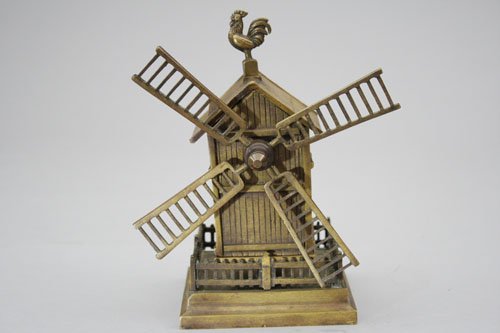 Windmill Bank On Pedestal Base: French – Circa 1895 This bank is extremely scarce with a rooster finial and a fenced in yard. Material: Brass