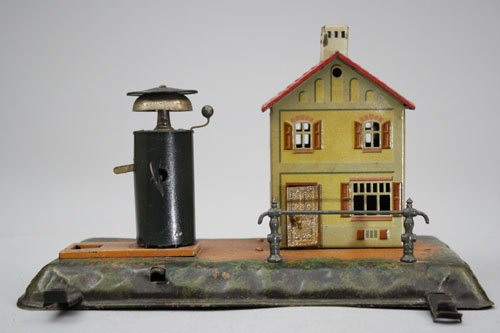 Watchman Station 0 Gauge Gebruder Bing: Gebruder Bing Germany – Circa 1915 It is 9½” long x 6” deep. Material: Tin