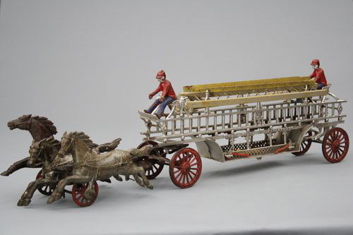 Hook & Ladder, Large: Ideal Toy Company Pennsylvania – Circa 1895 The Ideal Toy Company was only in business a few short years. Consequently, their toys are quite scarce. This is a large -scale hook & ladder and is 31”