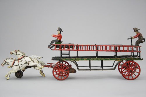 Hook & Ladder: Pratt & Letchworth Company Buffalo, New York – Circa 1890 Pratt & Letchworth toys are famous for their delicate details, color and attention to accuracy. This toy is 24” long.Material: Cast Iron