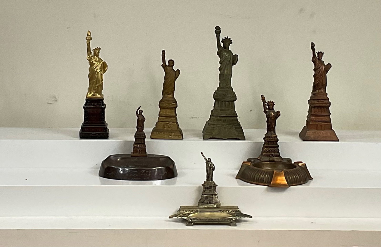 Statue of Liberty Souvenirs (7 total): American - most 1920's/30's; one Cologne Bottle 2000 4" - 7" tall