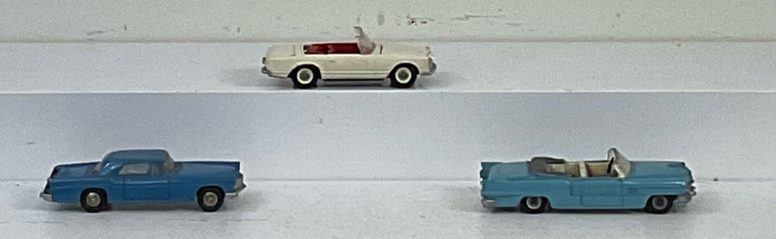 Three miniature toy autos (1 of 2)