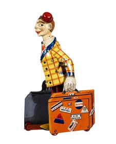 Comical Man with Suitcases - Tin Toy