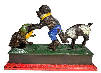 Initiating Bank - First Degree: Made by Mechanical Novelty Works. New Britain, Connecticut - Early 1880's. Though esoteric and obscure, the imagery for this bank seems to reference the bizarre initiating rights of the International
