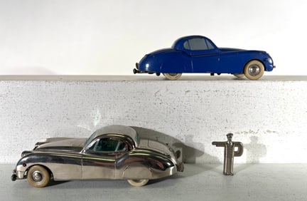 Two Windup Jaguars