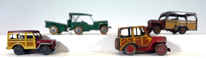 Four Tinplate Windup Jeeps