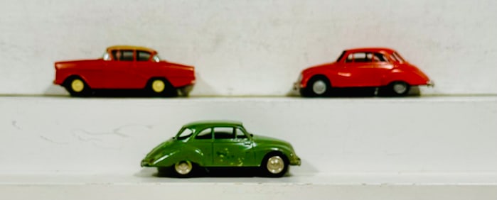 Three Diecast Autos