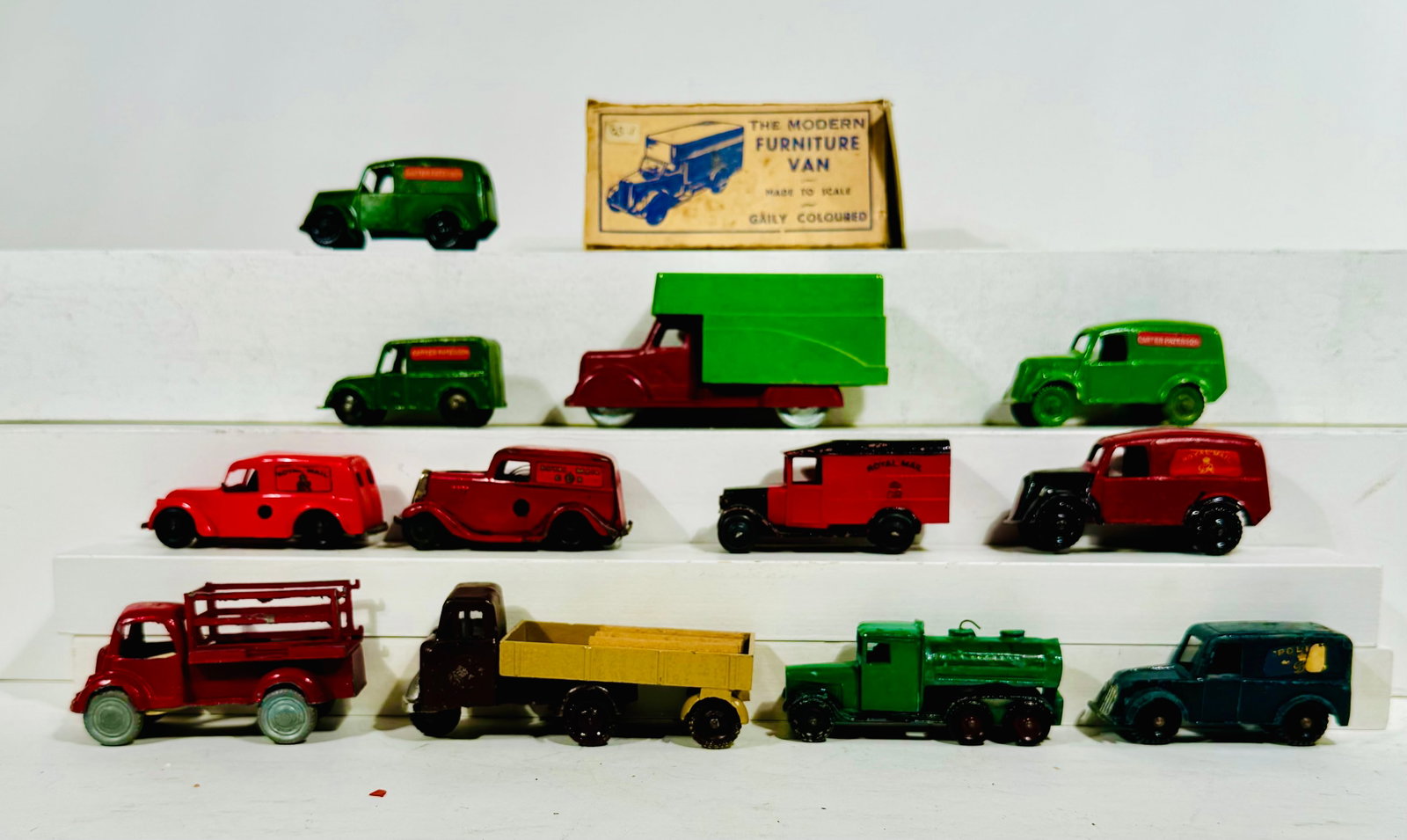 Twelve Diecast Trucks / Vans: Made by Dinky, Charbens and Skybird. English - 1930's to 1950's - 3 1/2" to 5 1/2" Long.