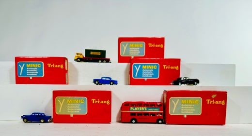 Five HO Slot Cars with Boxes