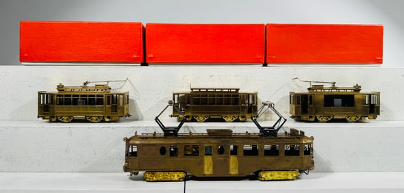Four Brass Trolleys