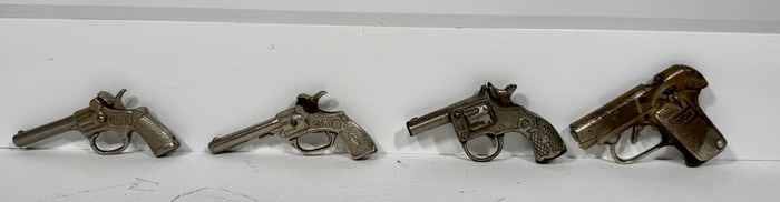 Three Cast Iron Cap Guns