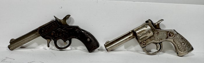 Two Cast Iron Cap Guns