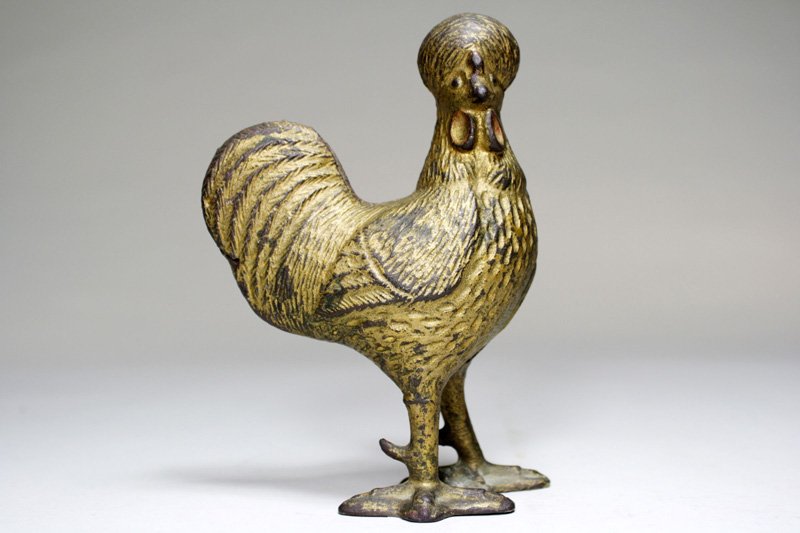 Polish Rooster Still Bank: Probably A. C. Williams Ravenna, Ohio – Circa 1905 The Polish Rooster is one of the hardest animal still banks to procure. This one is quite excellent and without a repair. Material: Cast Iron