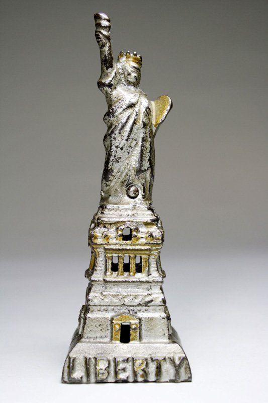 Statute of Liberty – Medium Still Bank: Made by Kenton Hardware Kenton, Ohio – Circa 1915 Material: Cast Iron